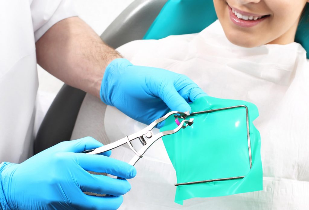 a dentist discusses Root Canal in Medford WI