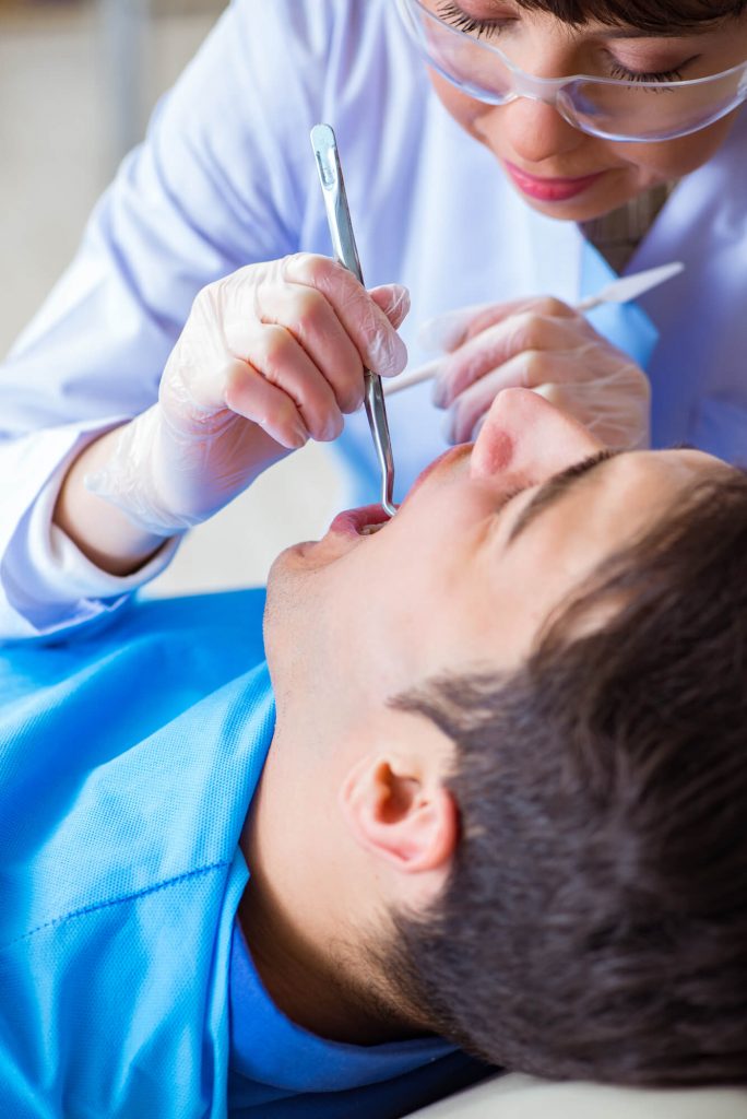 oral surgeon in medford prepping patient before surgery