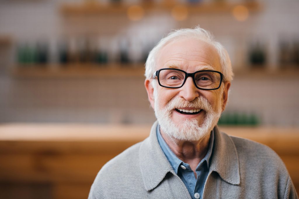a smiling senior with dentures in ladysmith