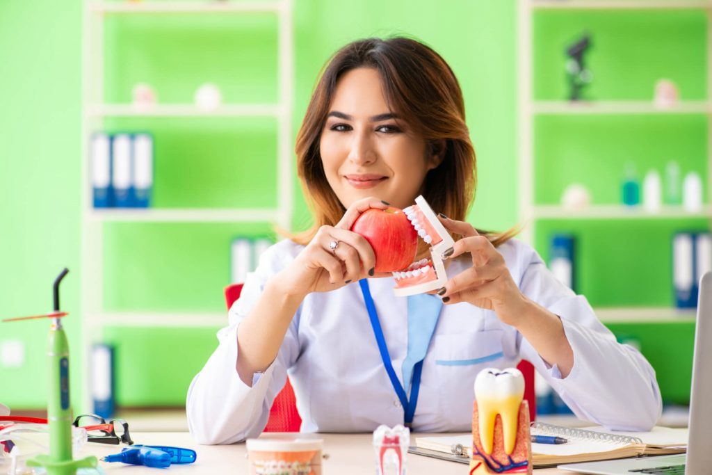 dentist explains how dentures in Medford work