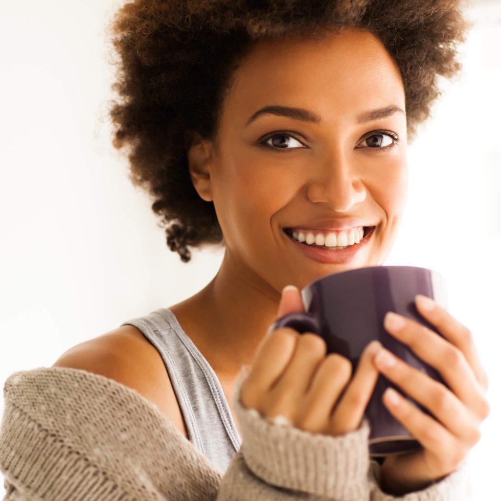 woman with dental implant woodruff wi