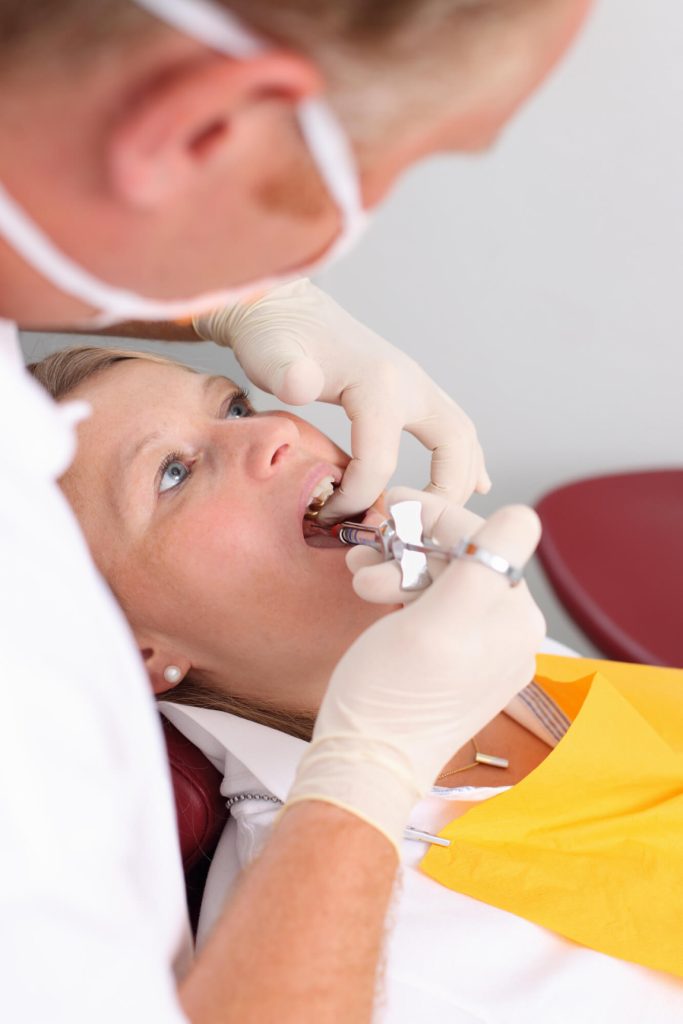 patient after getting laser dentistry in park falls 