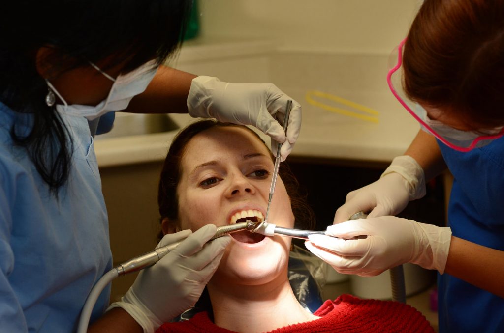 a woman getting a root canal in medford wi