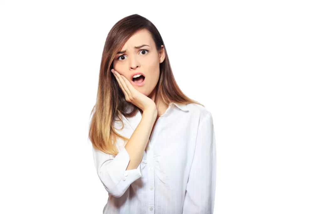 woman with tooth pain needs medford endodontics